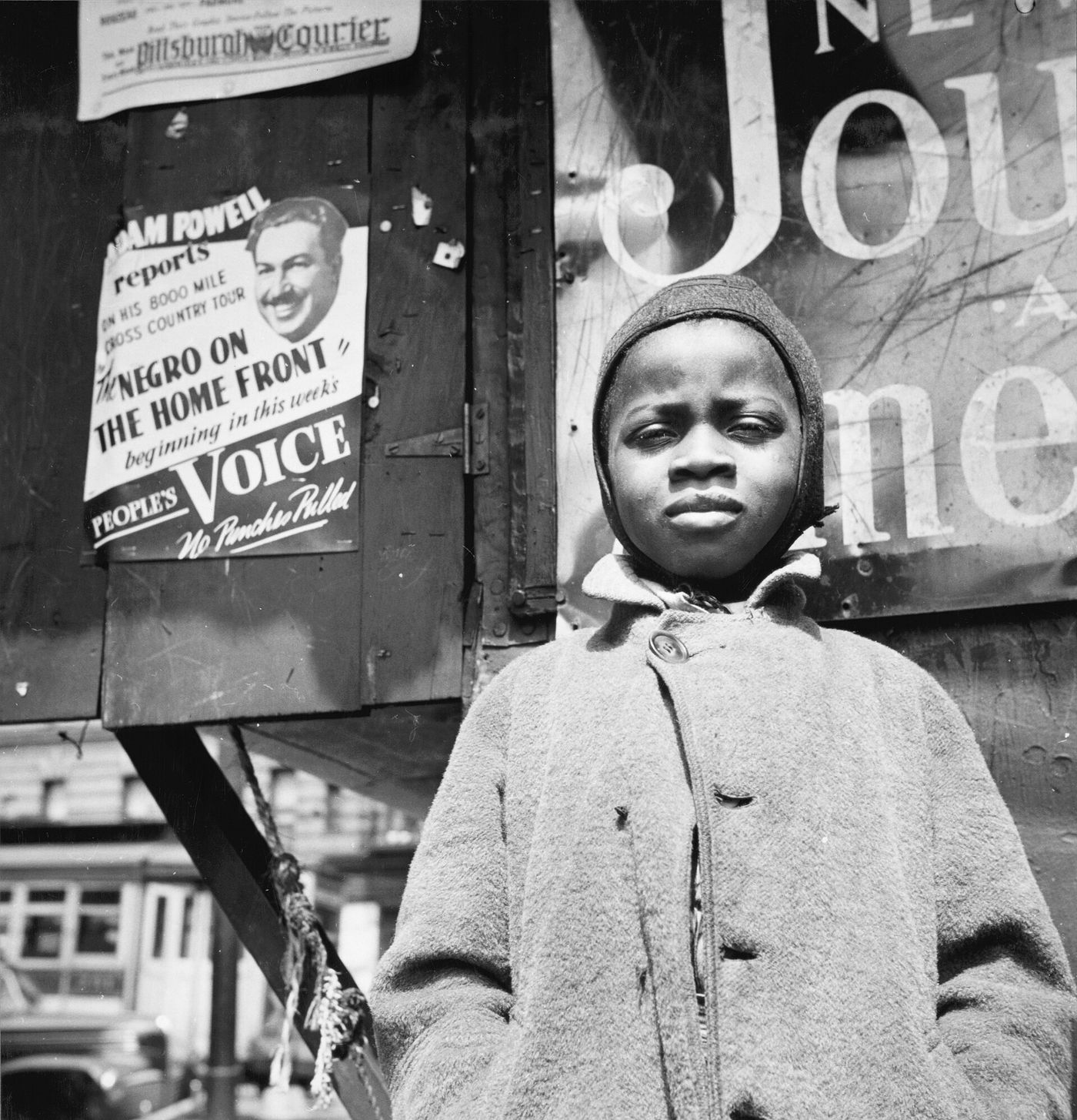 A newsboy in Harlem, photographed in May 1943
